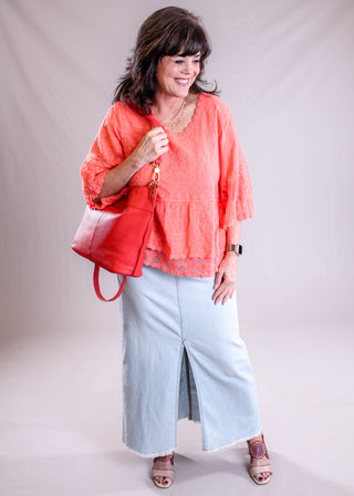 Democracy Elbow Sleeve Peplum Top modeled view - Fashion Crossroads Inc.