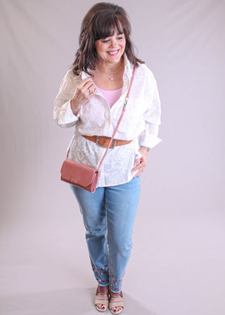 Hobo Romy Crossbody Wallet In Rose modeled view - Fashion Crossroads Inc.