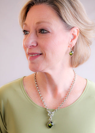 Myka Hyde Cosmic Euroback Earrings with Olivine Swarovski Crystals modeled view- Fashion Crossroads