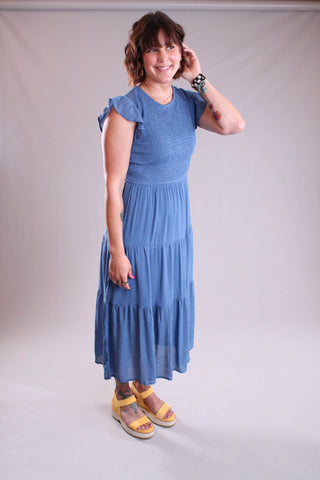 Blu Pepper Smocked Tiered Dress with Flutter Sleeves side view - Fashion Crossroads Inc