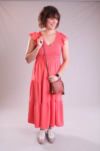 HOBO Nash Small Crossbody in Rust model view - Fashion Crossroads Inc