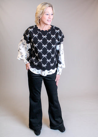 Blu Pepper Long Sleeve Blouse with Bow Print Model View - Fashion Crossroads Inc
