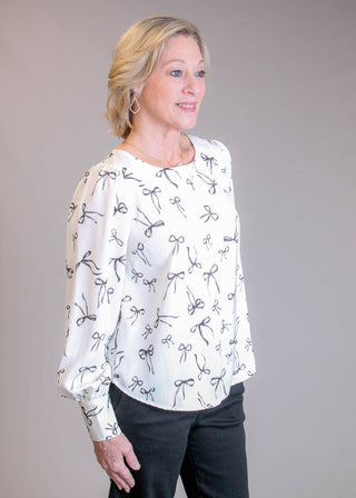 Blu Pepper Long Sleeve Blouse with Bow Print Side View - Fashion Crossroads Inc