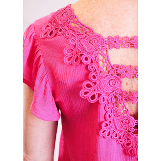 MINE V Neck Blouse with Embroidered Back detail view - Fashion Crossroads Inc