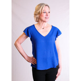 MINE V Neck Blouse with Embroidered Back - Fashion Crossroads Inc