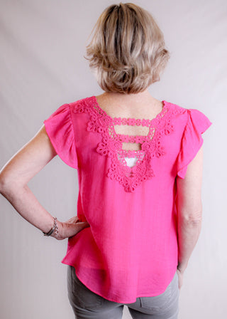 MINE V Neck Blouse with Embroidered Back back view - Fashion Crossroads Inc