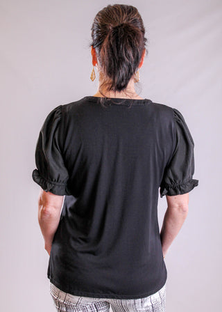 Staccato Short Sleeve V Neck Top with Snaps back view - Fashion Crossroads Inc.