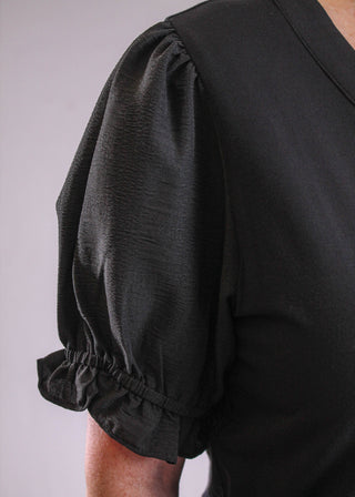 Staccato Short Sleeve V Neck Top with Snaps sleeve view - Fashion Crossroads Inc.