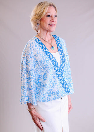 Charlie B 3/4 Sleeve Printed Blouse with Cross Front front side view - Fashion Crossroads Inc.