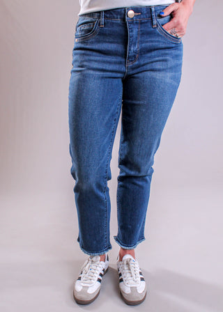 Democracy Slim Straight Leg Jean With Frayed Hem front view - Fashion Crossroads Inc 