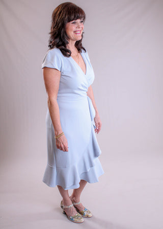Maggie London Pleated Surplice Dress with Cap Sleeves side view - Fashion Crossroads Inc 