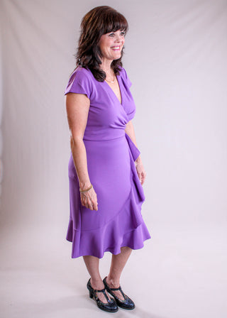 Maggie London Pleated Surplice Dress with Cap Sleeves side view - Fashion Crossroads Inc 