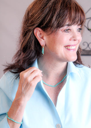 Kendra Scott Sylvia Earring in Teal Amazonite modeled view - Fashion Crossroads Inc.