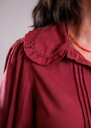 Democracy Button Down Blouse with Ruffle Edge front view - Fashion Crossroads Inc 