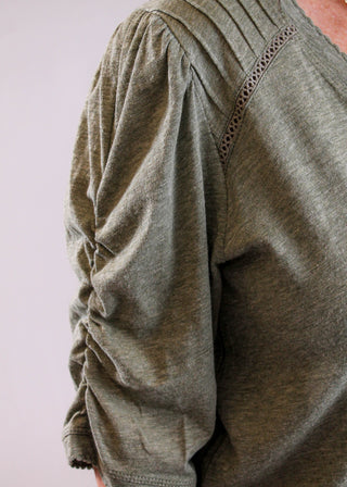 Democracy Scallop V Neck Top with Puff Elbow Sleeves detail view - Fashion Crossroads Inc