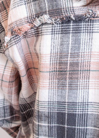 Tribal Sportswear Long Sleeve Plaid Shirt with Fringe Hem detail view - Fashion Crossroads Inc.