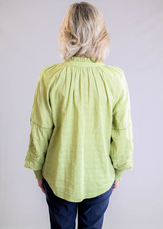 Tribal Sportswear Notch Neck Blouse with Jaquard Applique Sleeve back view - Fashion Crossroads