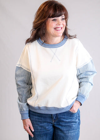 Blu Pepper Denim Sleeve Sweatshirt Front View - Fashion Crossroads Inc