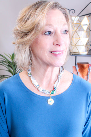 Gemelli Tan and Turquoise Scarf Necklace with Gold Tone Coin Front View  - Fashion Crossroads Inc