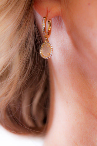 Kendra Scott Daphne Gold Crystal Frame Earrings modeled view - Fashion Crossroads Inc.