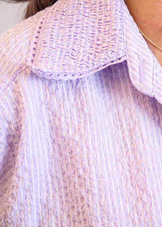 Democracy Bubble Hem Top collar view - Fashion Crossroads Inc.