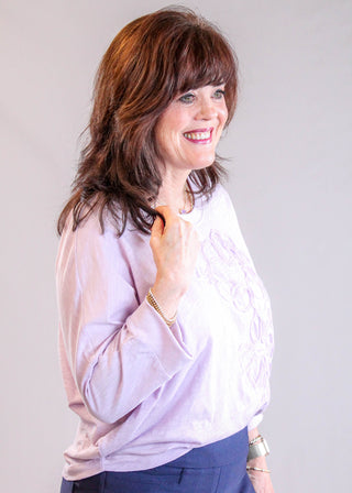 Democracy Dolman Sleeve Top side view - Fashion Crossroads Inc.