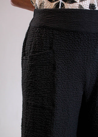 Habitat Crinkle Crepe Aria Wide Leg Crop Pant in Black detail view - Fashion Crossroads Inc.