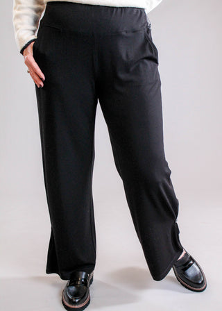 Habitat Core Travel Knit Pleated Wide Leg Pant in Black front view - Fashion Crossroads Inc.