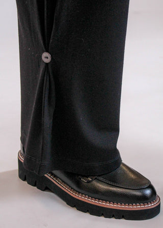 Habitat Core Travel Knit Pleated Wide Leg Pant in Black detail view - Fashion Crossroads Inc.