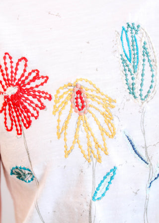 Caite Short Sleeve Cotton Malia Tee with Embroidered Flowers Detail View - Fashion Crossroads Inc