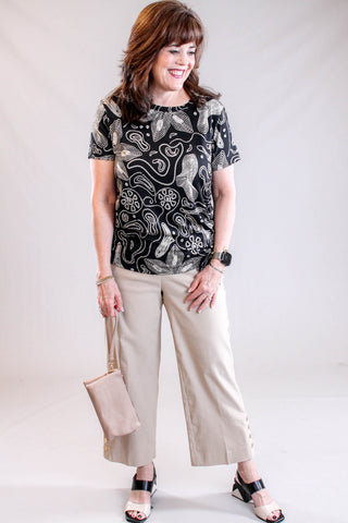 Tribal Sportswear Printed Jersey Crew Neck Top with Side Ruching Model View - Fashion Crossroads Inc