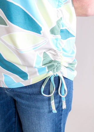 Tribal Sportswear Printed Jersey Crew Neck Top with Side Rouching Detail View - Fashion Crossroads Inc