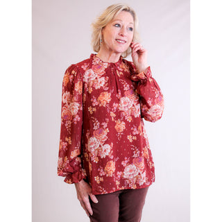 Staccato Ruffle Neck Blouse with Long Sleeves model view - Fashion Crossroads Inc