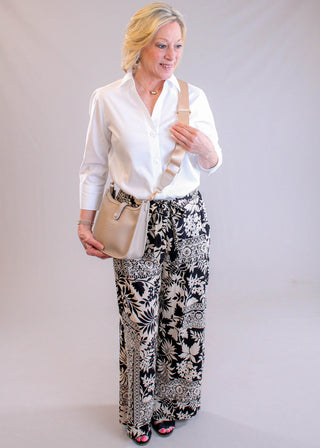 Nostalgia Black & Tan Floral Self-Tie Wide Leg Pant modeled view - Fashion Crossroads Inc.