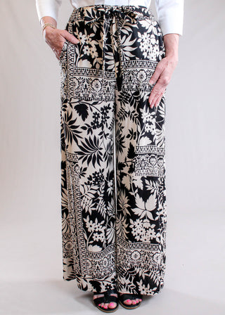 Nostalgia Black & Tan Floral Self-Tie Wide Leg Pant front view - Fashion Crossroads Inc.