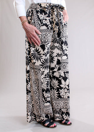Nostalgia Black & Tan Floral Self-Tie Wide Leg Pant side view - Fashion Crossroads Inc.