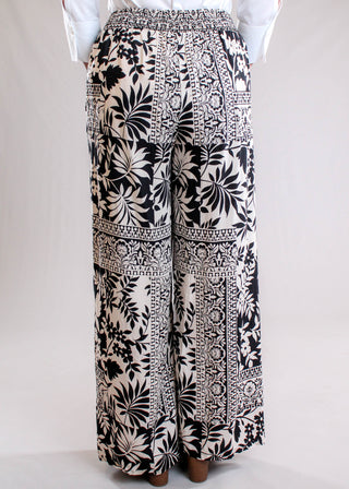 Nostalgia Black & Tan Floral Self-Tie Wide Leg Pant back view - Fashion Crossroads Inc.