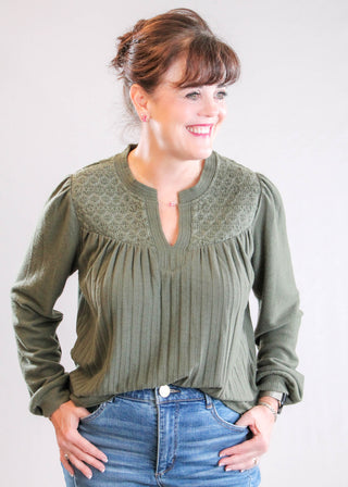 Democracy Long Sleeve Half Placket Top with Mandarin Collar tucked view - Fashion Crossroads Inc.