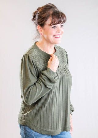 Democracy Long Sleeve Half Placket Top with Mandarin Collar side view - Fashion Crossroads Inc.